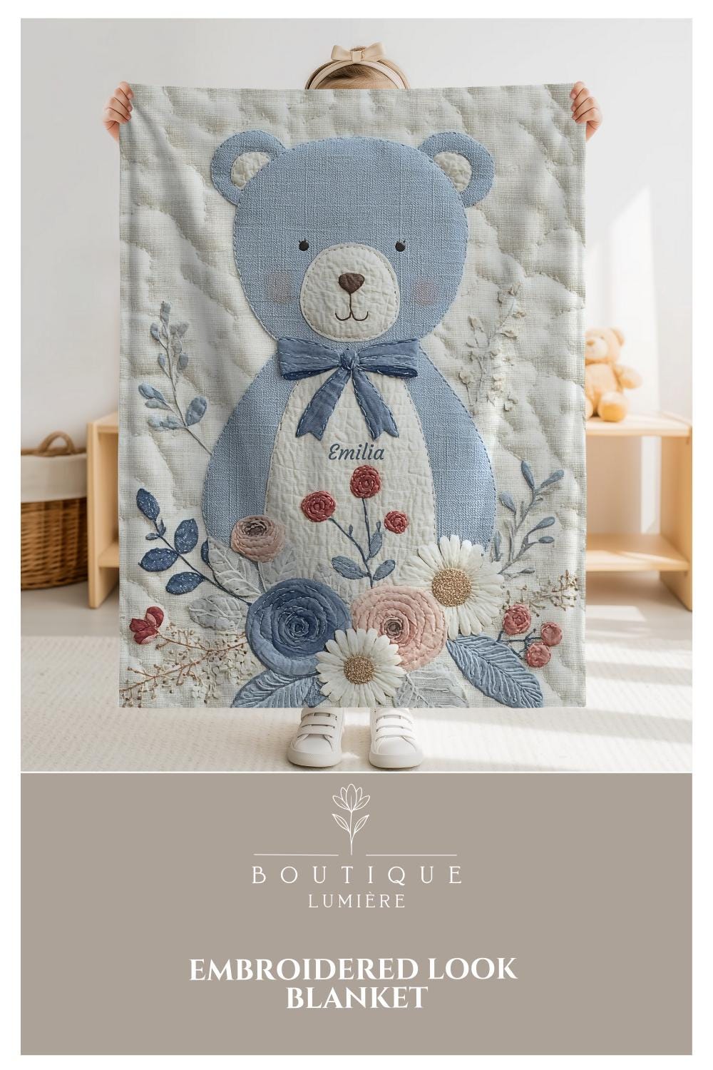 Personalized blue bear blanket with embroidered-look details in soft neutral colors. A cozy newborn blanket and timeless boutique baby gift.