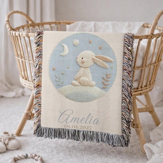 Personalized bunny woven blanket made from 100% cotton.Embroidered-look baby bunny design, custom name & optional birth date — a calm nursery tapestry and keepsake gift.