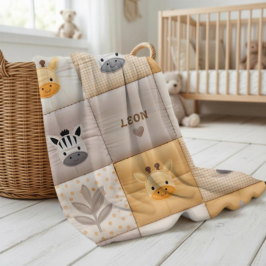 Personalized patchwork look baby blanket with name, giraffe and zebra in a soft safari quilt design. Cozy newborn blanket and thoughtful baby gift.