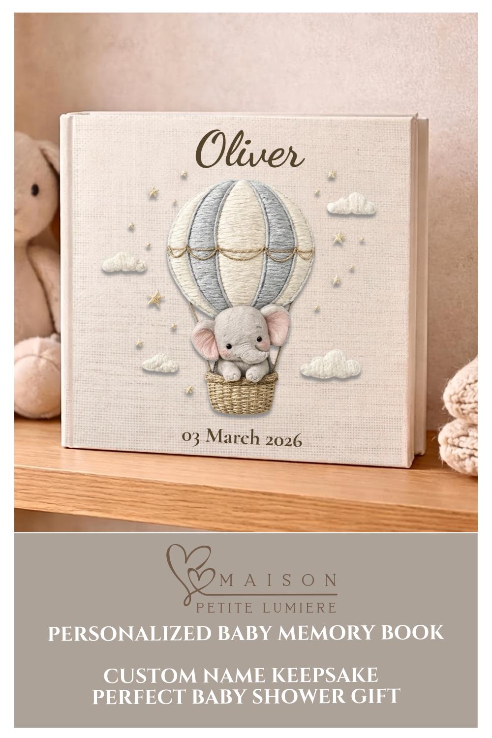 Personalized elephant baby memory album with hot air balloon design, custom name and optional birth date. A neutral nursery keepsake and timeless newborn photo book.