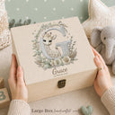 This newborn keepsake box is designed to hold your baby’s most treasured memories. A meaningful gift that helps parents keep every special moments in one place.
Crafted from wood with a soft neutral look, this box features a delicate giraffe illustration with letter G. The embroidery-style artwork adds a refined and timeless touch.