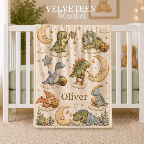 Personalized Dinosaur Baby Blanket featuring an embroidered-look print with adorable dinosaurs, sleepy moons, fluffy clouds, and twinkling stars.