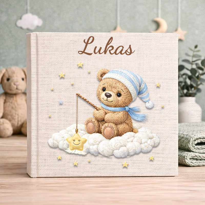 Personalized baby memory book with a sleepy teddy bear on a cloud