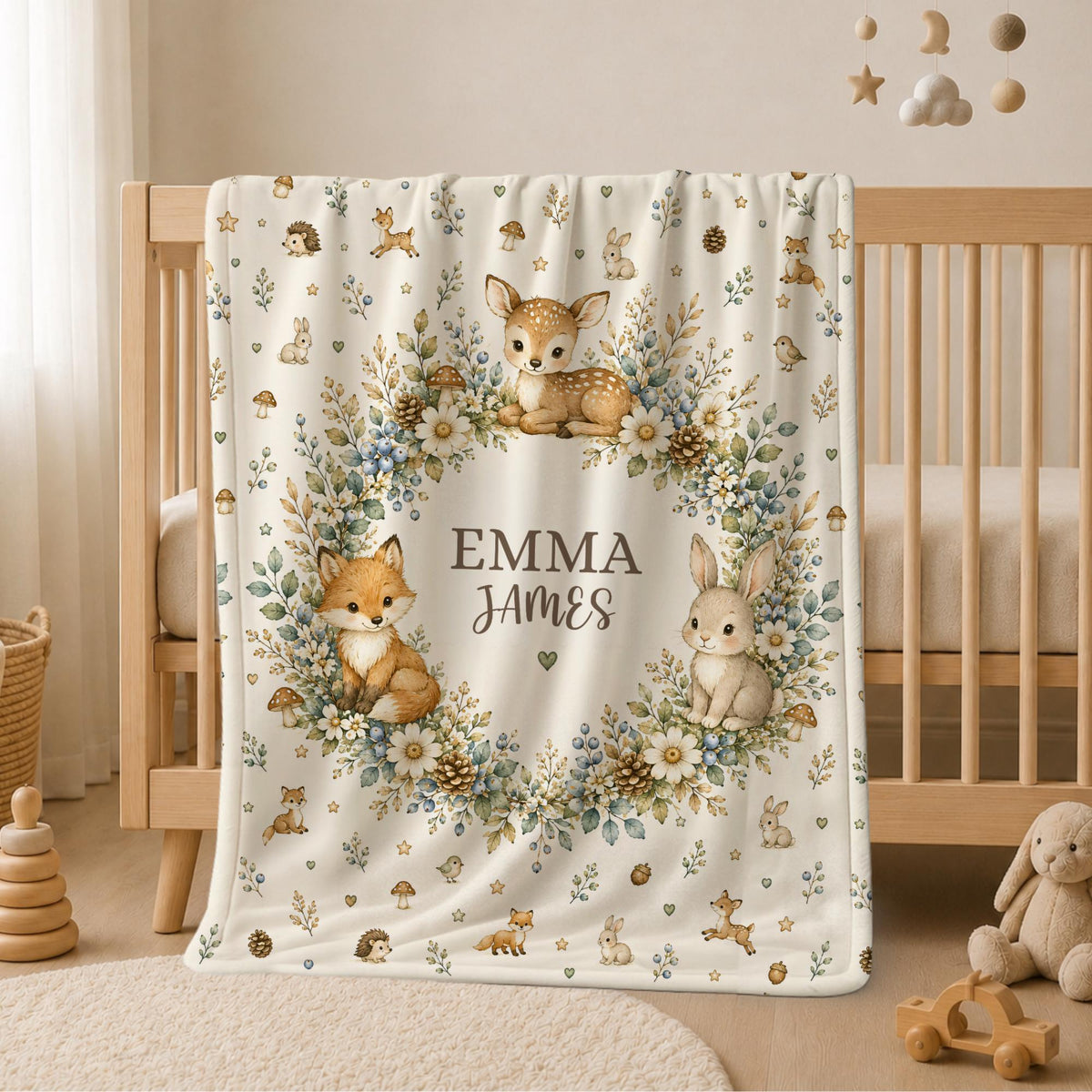 Personalized woodland baby blanket with a deer, fox and bunny among forest florals