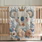 Koala bear baby blanket with embroidered-look floral design in gentle neutral tones. A cozy newborn blanket and timeless baby gift for girls