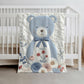Personalized blue bear blanket with embroidered-look details in soft neutral colors. A cozy newborn blanket and timeless boutique baby gift.