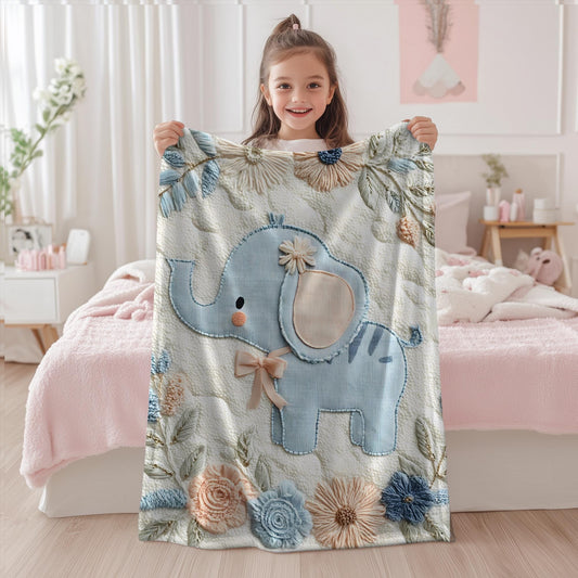 Soft embroidered-look elephant baby blanket with pastel florals. Neutral tones, cozy fabric — a boutique newborn gift for calm, modern nursery decor.