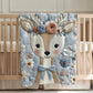 Soft embroidered-look deer baby blanket with pastel florals. Neutral tones, cozy fabric — a boutique newborn gift for calm, modern nursery decor.
