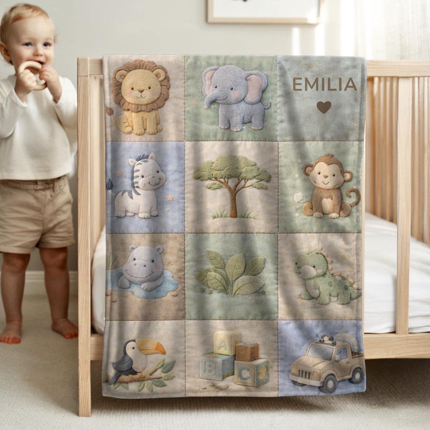 Personalized patchwork look baby blanket with name and sweet safari animals like lion, elephant and monkey in a soft quilt style design.