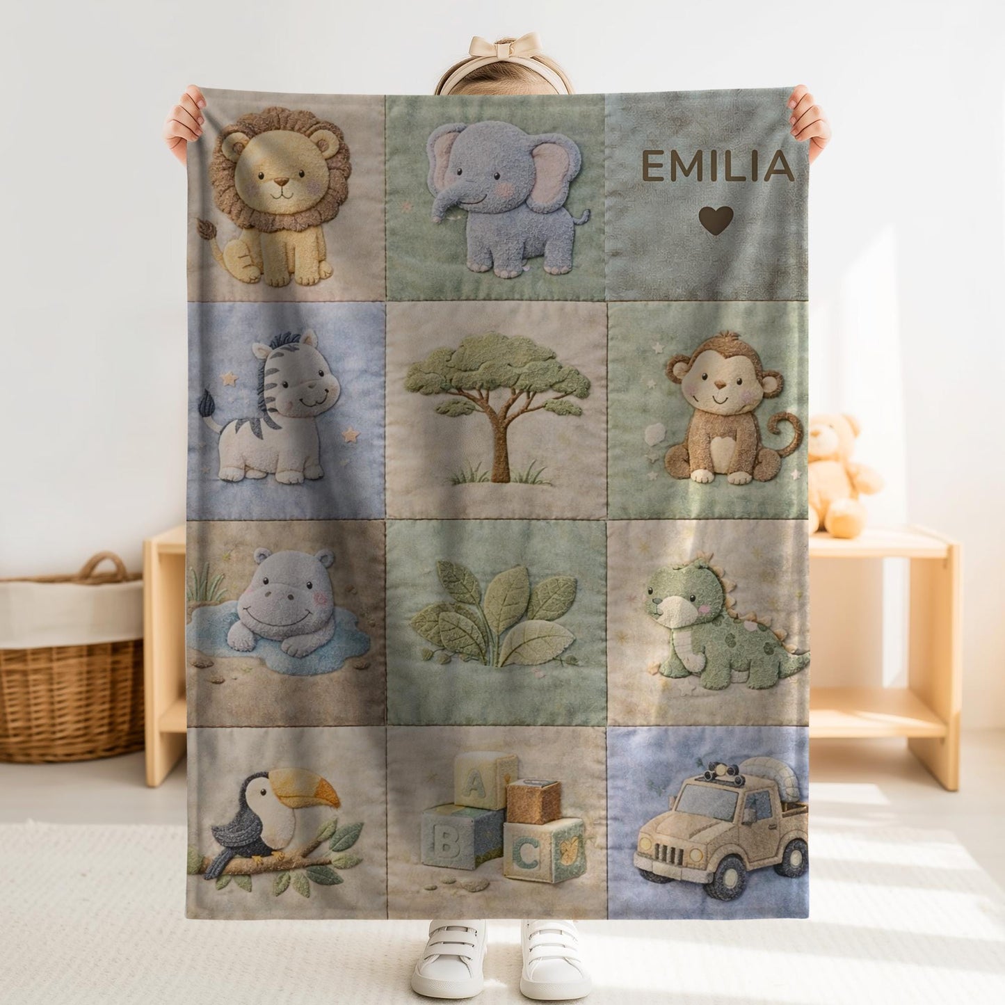 Personalized patchwork look baby blanket with name and sweet safari animals like lion, elephant and monkey in a soft quilt style design.