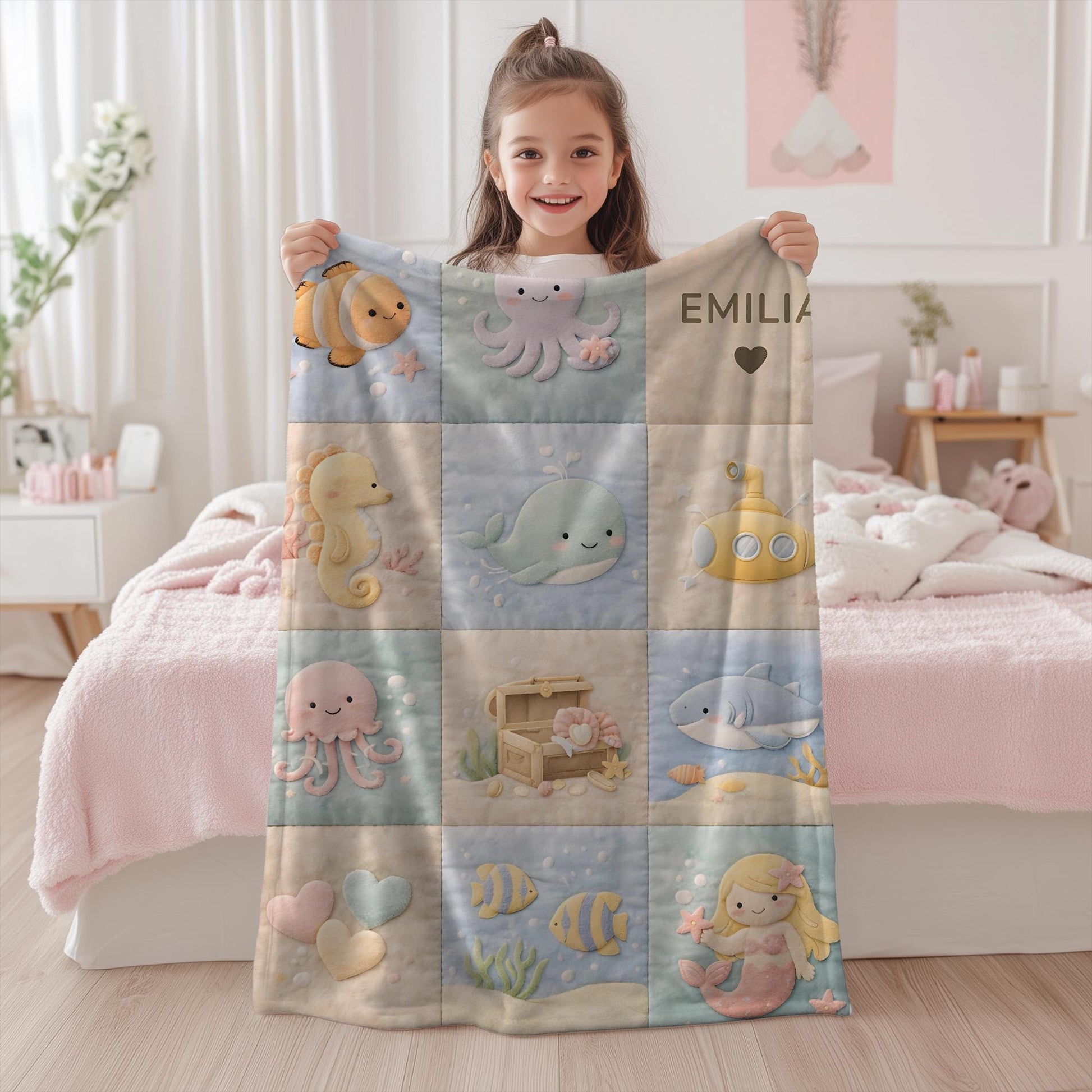 Personalized patchwork look baby blanket with name and sweet underwater motifs like fish, whale, octopus and mermaid in a soft quilt style design.
