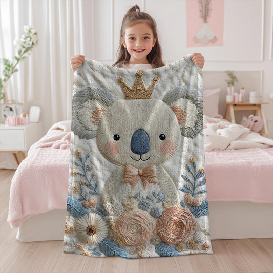 Koala bear baby blanket with embroidered-look floral design in gentle neutral tones. A cozy newborn blanket and timeless baby gift for girls