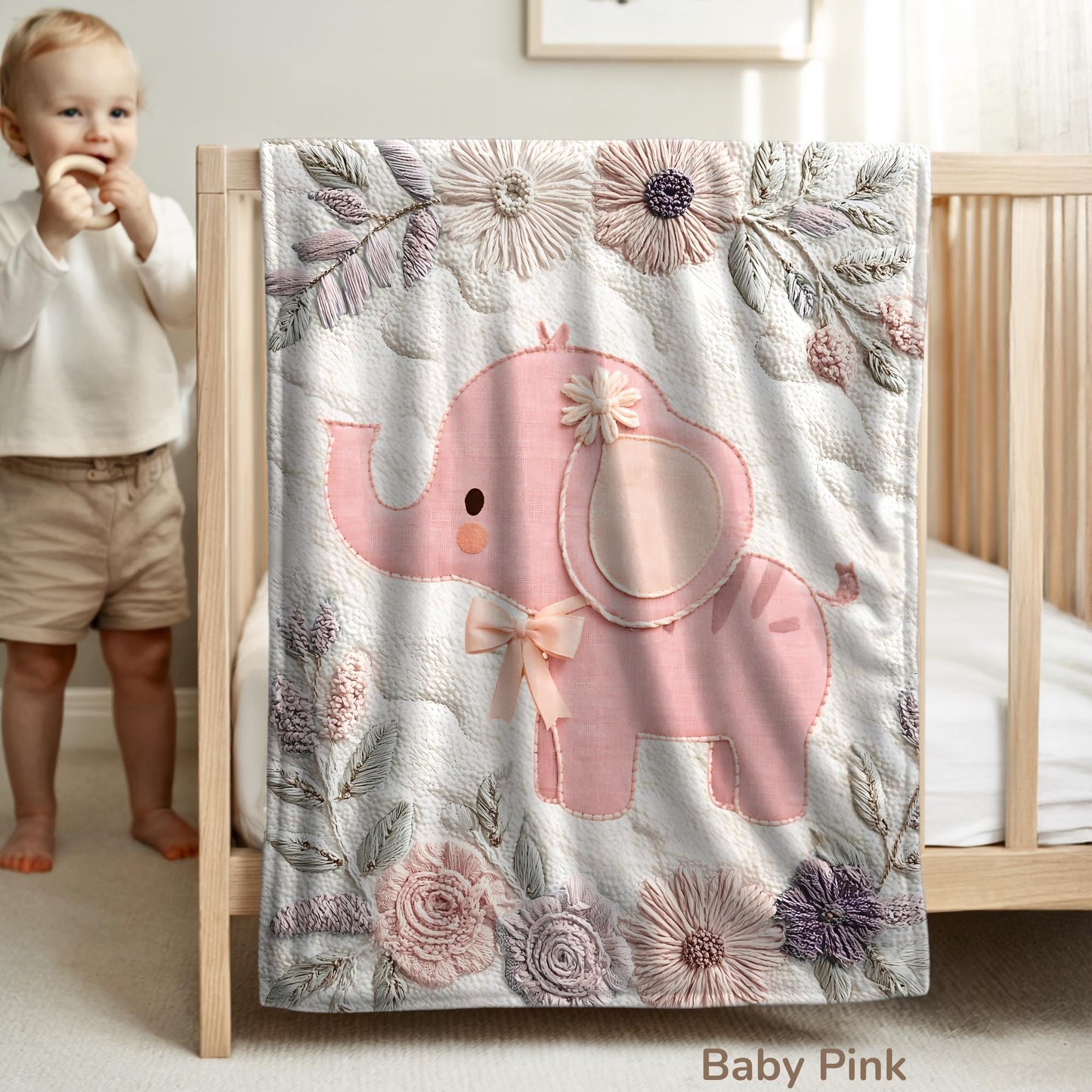 Soft embroidered-look elephant baby blanket with pastel florals. Neutral tones, cozy fabric — a boutique newborn gift for calm, modern nursery decor.