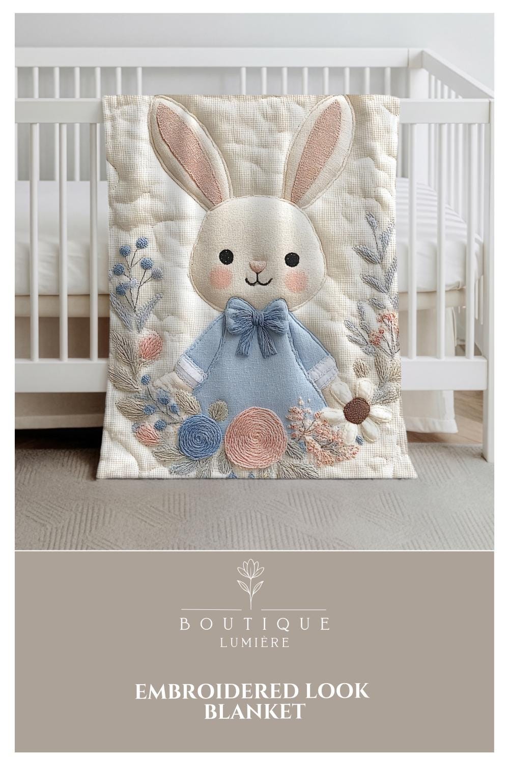 Bunny Baby blanket with embroidered-look details in soft neutral colors. A cozy newborn blanket and timeless boutique baby gift.