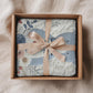 Personalized blue bear blanket with embroidered-look details in soft neutral colors. A cozy newborn blanket and timeless boutique baby gift.