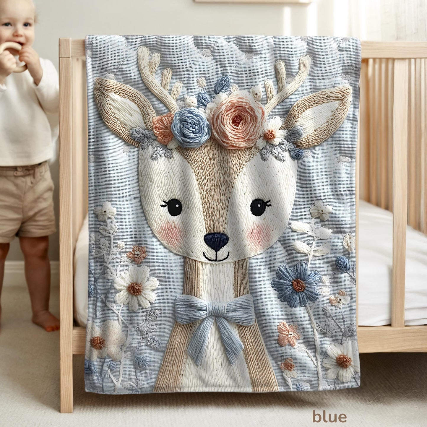 Soft embroidered-look deer baby blanket with pastel florals. Neutral tones, cozy fabric — a boutique newborn gift for calm, modern nursery decor.