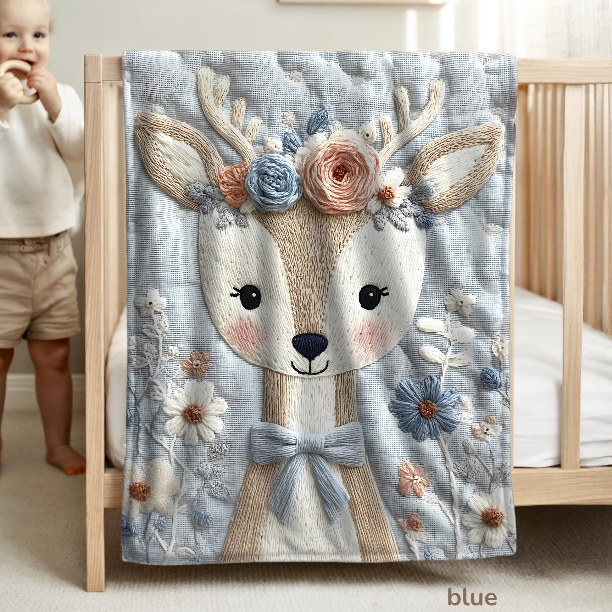 Soft embroidered-look deer baby blanket with pastel florals. Neutral tones, cozy fabric — a boutique newborn gift for calm, modern nursery decor.