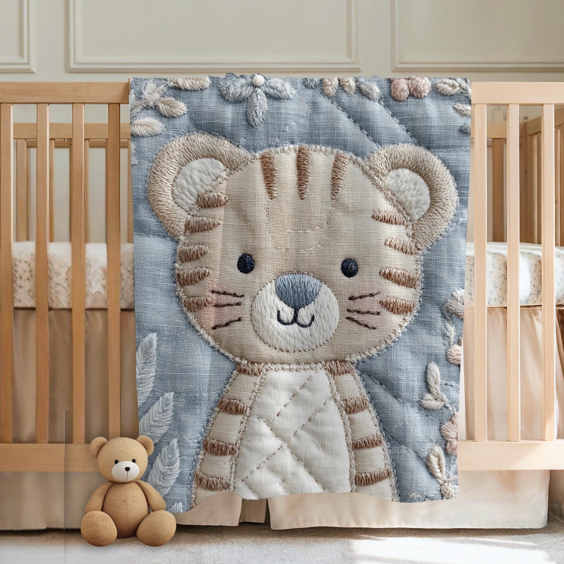 Soft embroidered-look baby blanket featuring a calm tiger motif with delicate floral details. Gentle neutral and pastel tones — a timeless boutique-style gift for modern, serene nurseries.