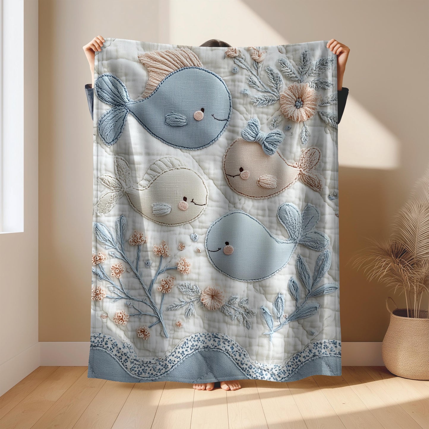 Soft embroidered-look baby blanket featuring a calm fish motif with delicate floral details. Gentle neutral and pastel tones — a timeless boutique-style gift for modern, serene nurseries.