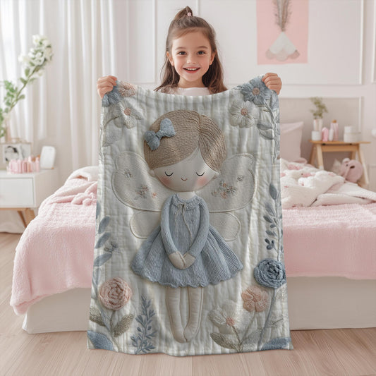 A soft embroidered-look baby blanket featuring a gentle angel fairy design in calm neutral tones. A timeless heirloom piece for modern nurseries, keepsakes and meaningful baby gifts.