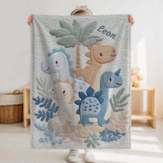 Personalized Dinosaur baby blanket with name - embroidered look details in soft neutral colors. A cozy newborn blanket and timeless boutique baby gift.