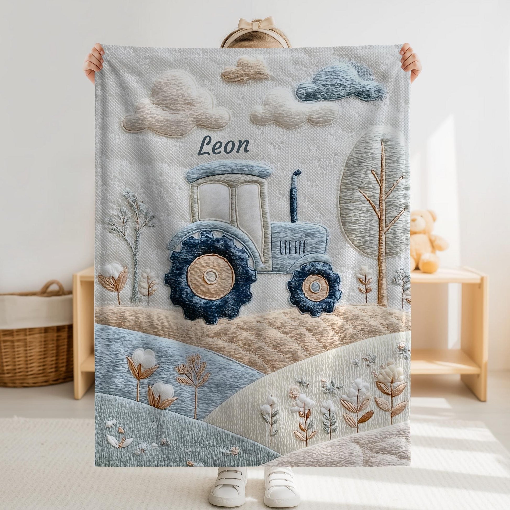 Personalized Traktor baby blanket with name - embroidered look details in soft neutral colors. A cozy newborn blanket and timeless boutique baby gift.