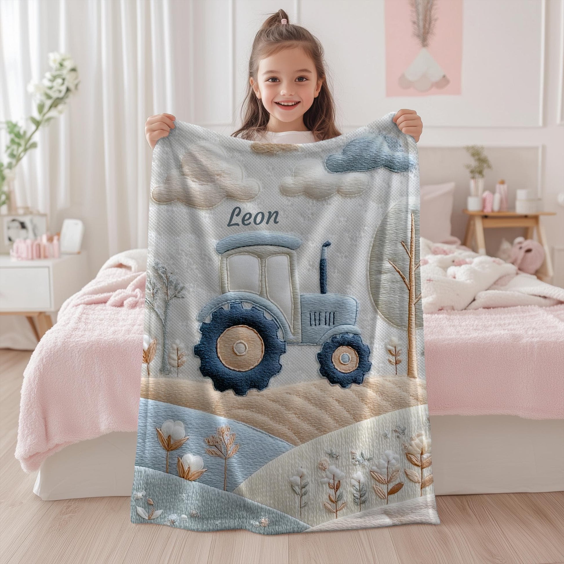 Personalized Traktor baby blanket with name - embroidered look details in soft neutral colors. A cozy newborn blanket and timeless boutique baby gift.