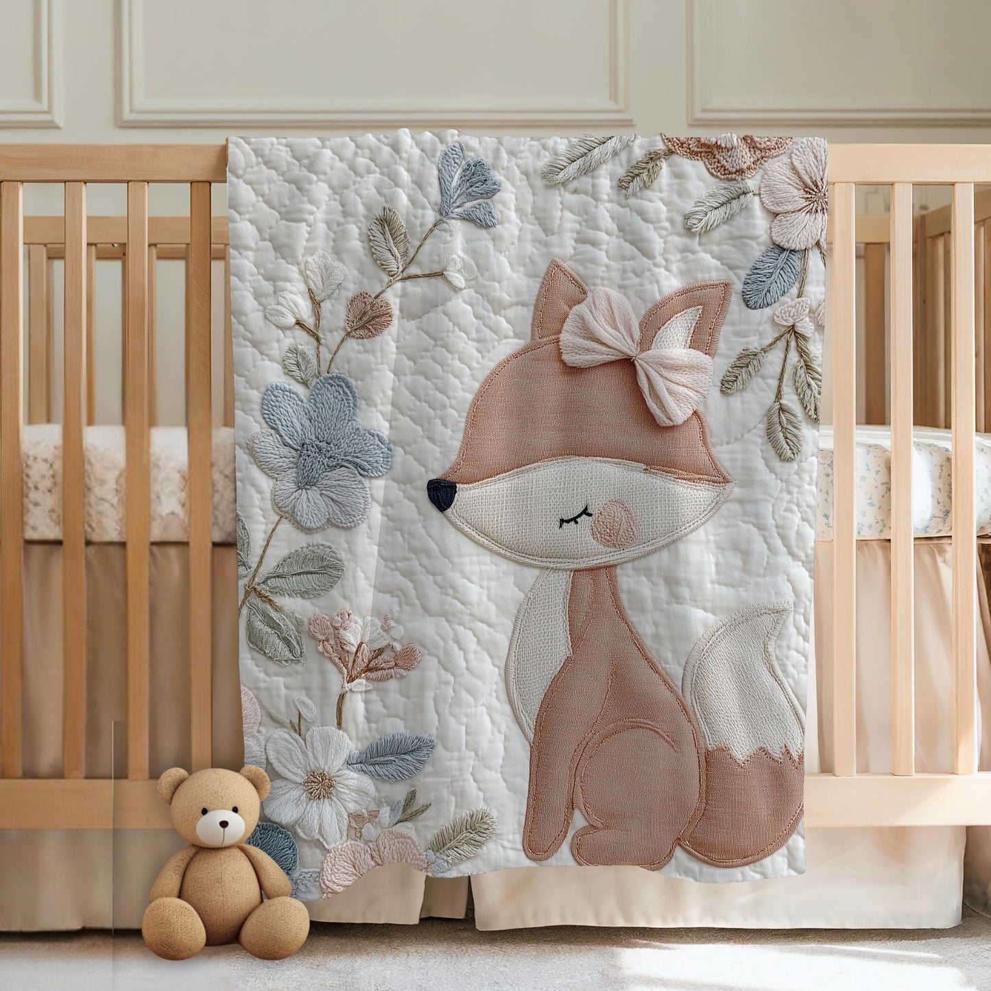 Fox baby blanket with an elegant embroidered-look fox and soft florals in muted blue, peach and ivory tones. A cozy neutral nursery blanket and timeless baby gift.