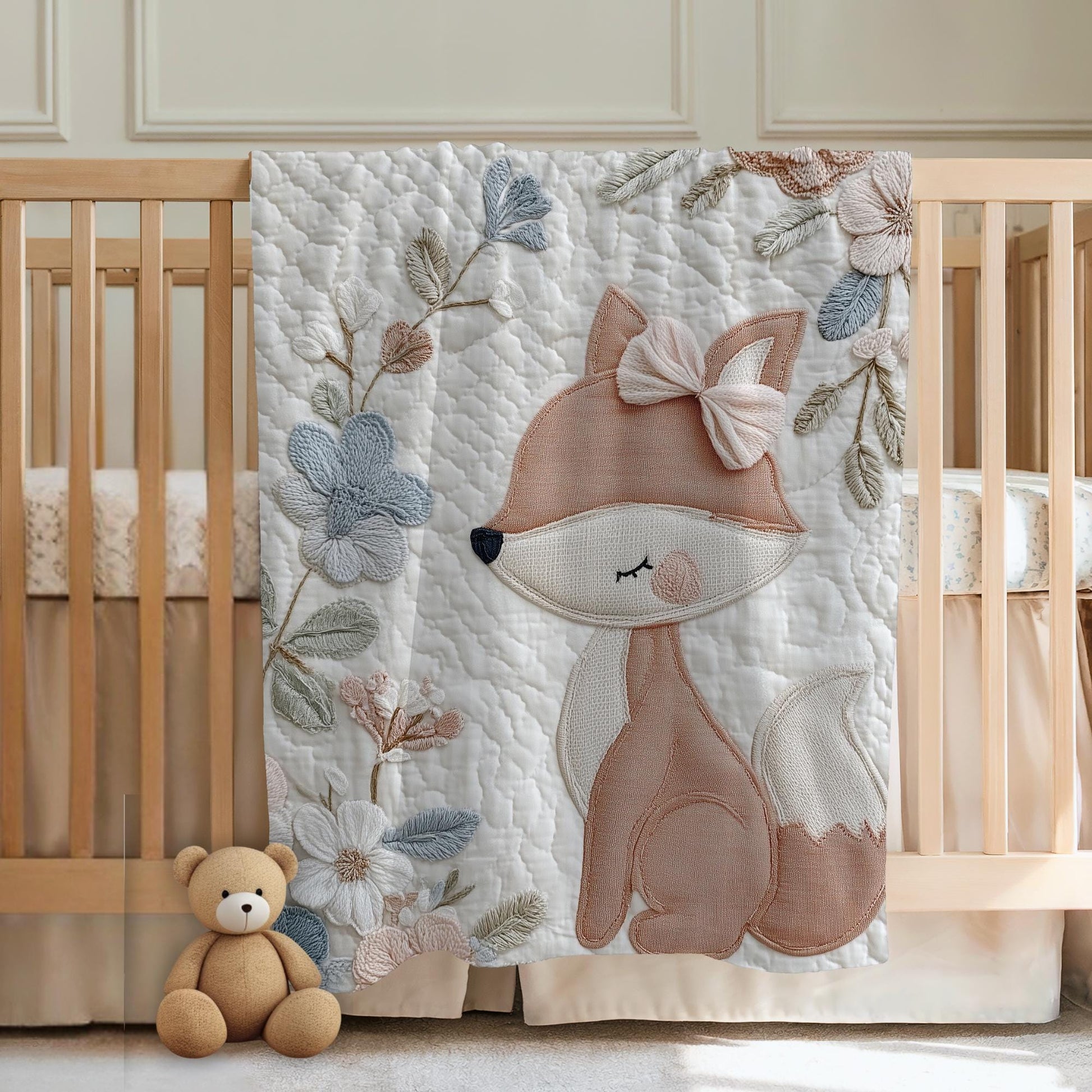 Fox baby blanket with an elegant embroidered-look fox and soft florals in muted blue, peach and ivory tones. A cozy neutral nursery blanket and timeless baby gift.