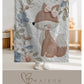 Fox baby blanket with an elegant embroidered-look fox and soft florals in muted blue, peach and ivory tones. A cozy neutral nursery blanket and timeless baby gift.