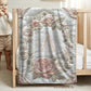 Personalized floral monogram baby blanket with elegant embroidered-look design. Soft, cozy fabric in calm neutral tones — a timeless nursery gift.