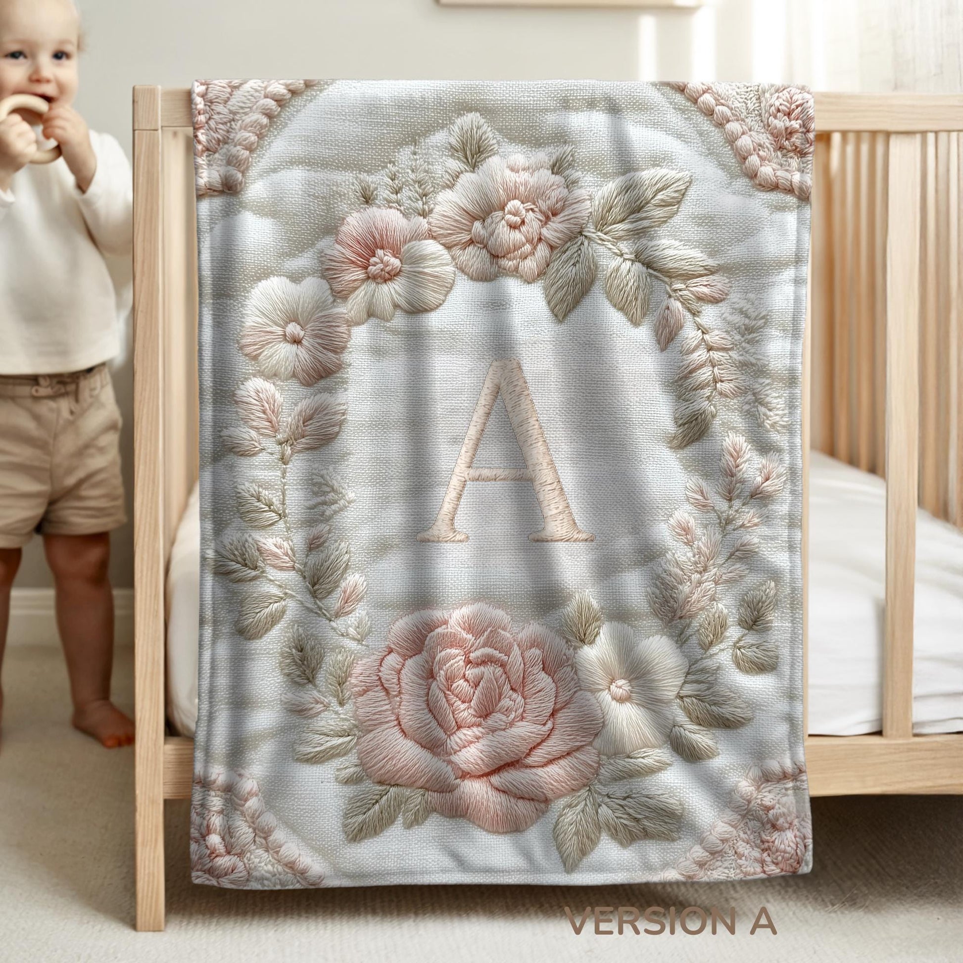 Personalized floral monogram baby blanket with elegant embroidered-look design. Soft, cozy fabric in calm neutral tones — a timeless nursery gift.