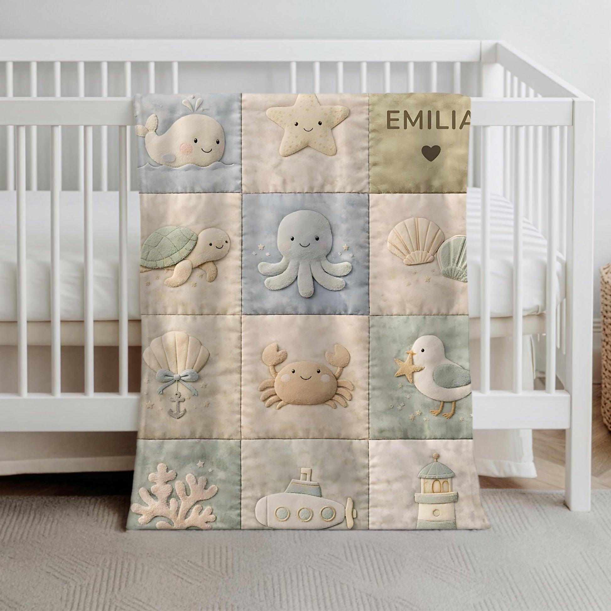 Personalized patchwork look baby blanket with name, crab, whale and octopus in a soft underwater quilt design. Cozy newborn blanket and baby gift.
