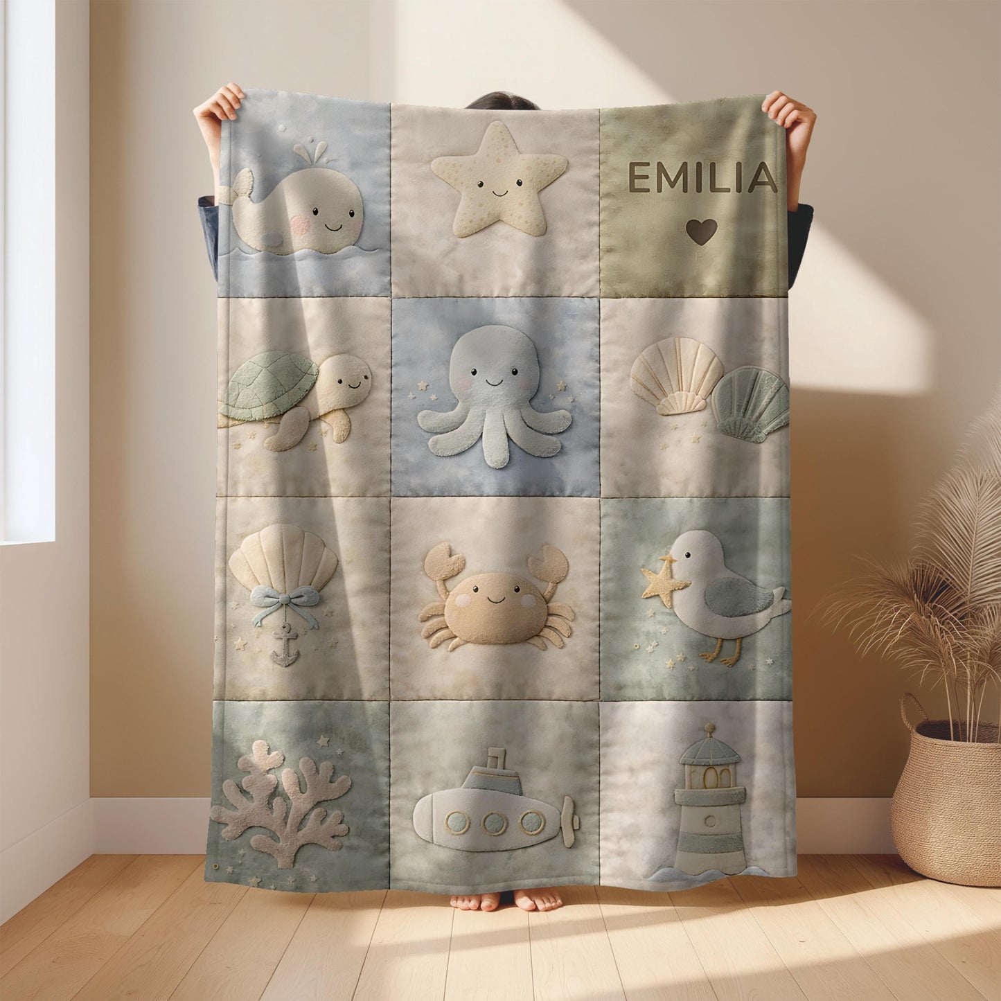 Personalized patchwork look baby blanket with name, crab, whale and octopus in a soft underwater quilt design. Cozy newborn blanket and baby gift.