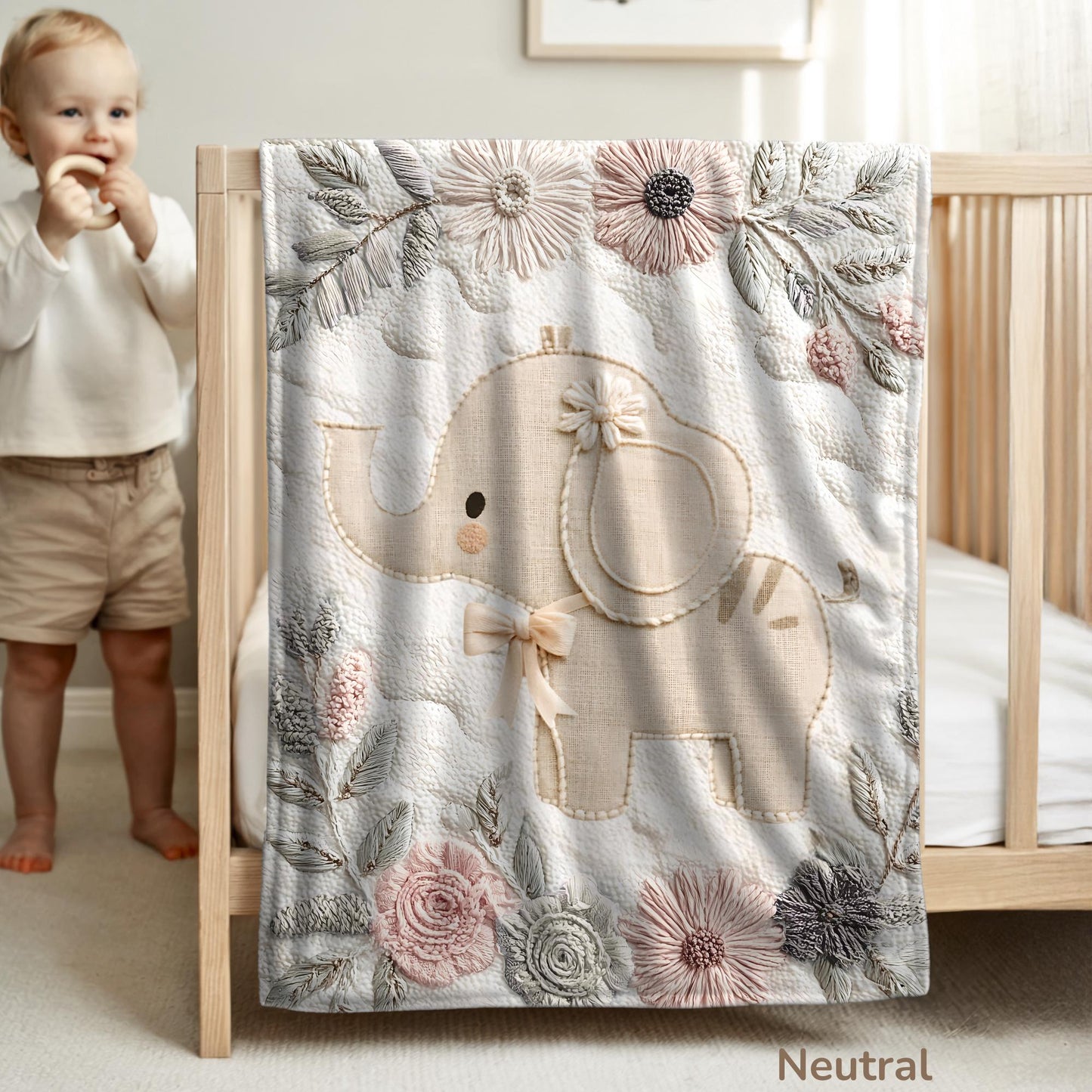 Soft embroidered-look elephant baby blanket with pastel florals. Neutral tones, cozy fabric — a boutique newborn gift for calm, modern nursery decor.