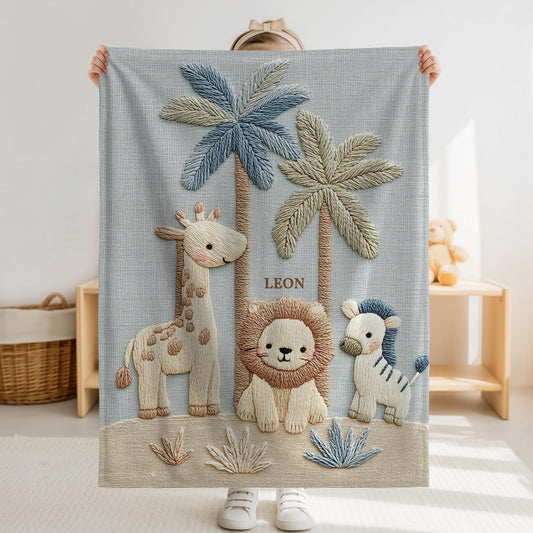Personalized safari baby blanket with name featuring calm animal embroidered-look design in neutral tones. Timeless nursery decor and a thoughtful newborn gift.