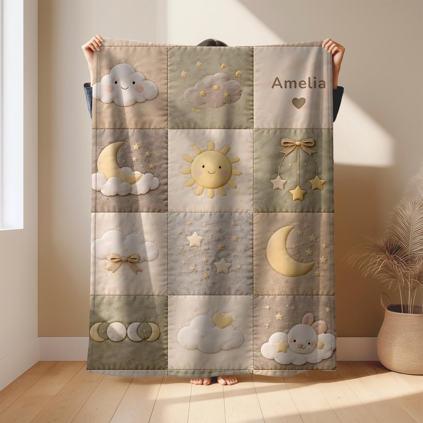 Personalized patchwork look baby blanket with clouds, sun, moon and stars in a soft quilt-style design. Neutral nursery colors with custom name.
