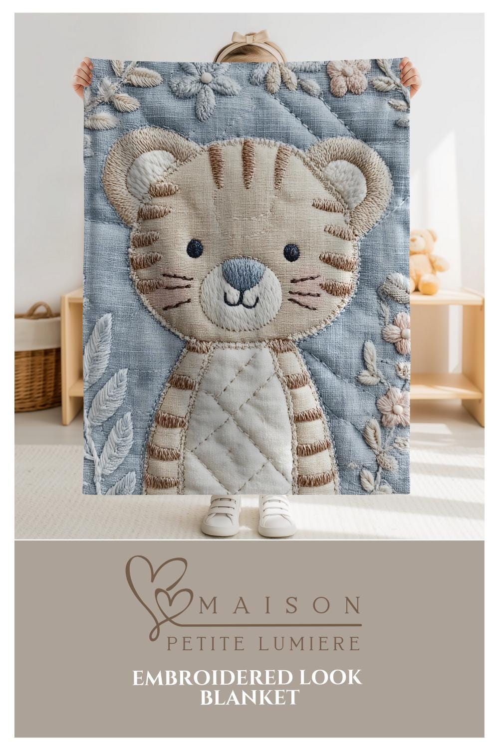 Soft embroidered-look baby blanket featuring a calm tiger motif with delicate floral details. Gentle neutral and pastel tones — a timeless boutique-style gift for modern, serene nurseries.