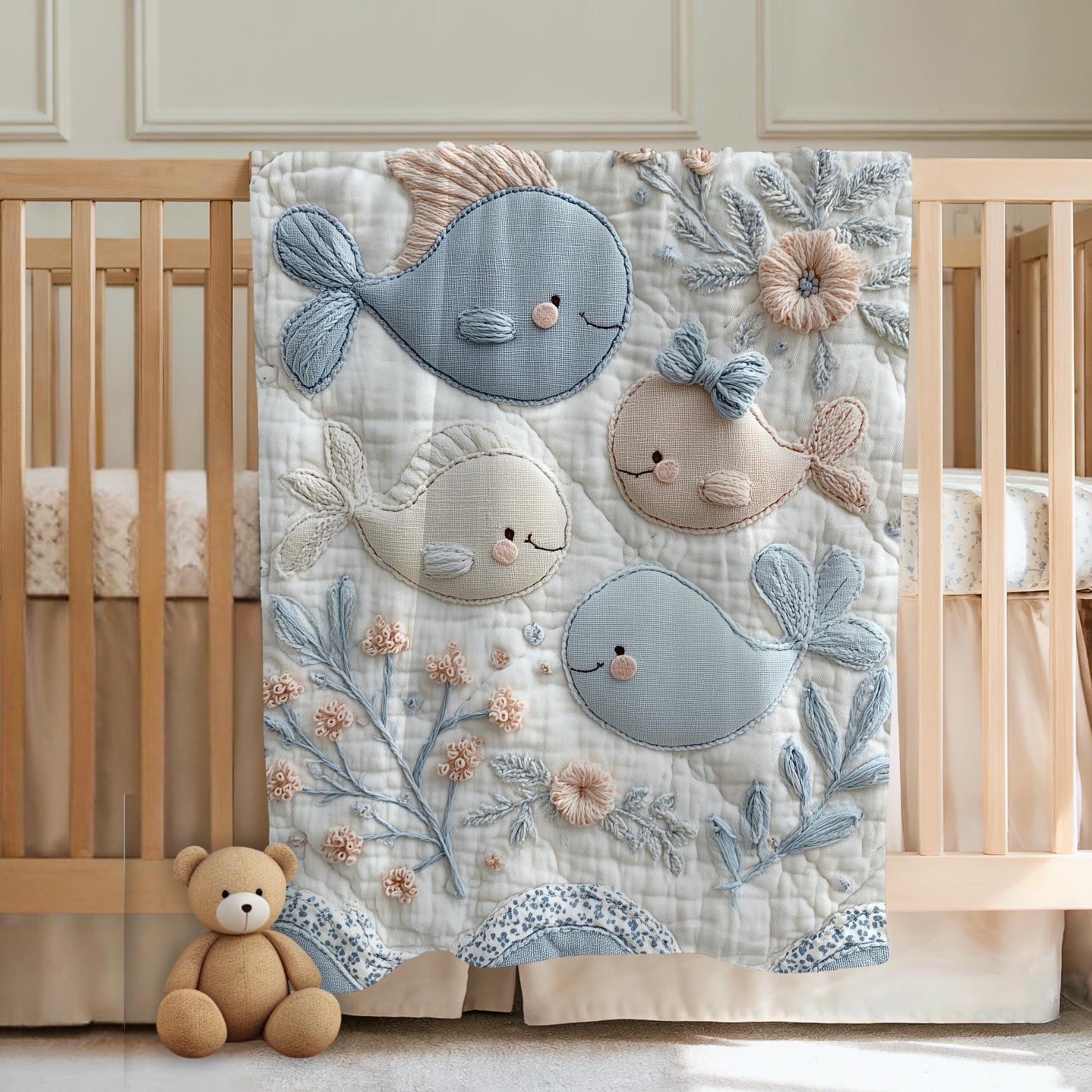 Soft embroidered-look baby blanket featuring a calm fish motif with delicate floral details. Gentle neutral and pastel tones — a timeless boutique-style gift for modern, serene nurseries.