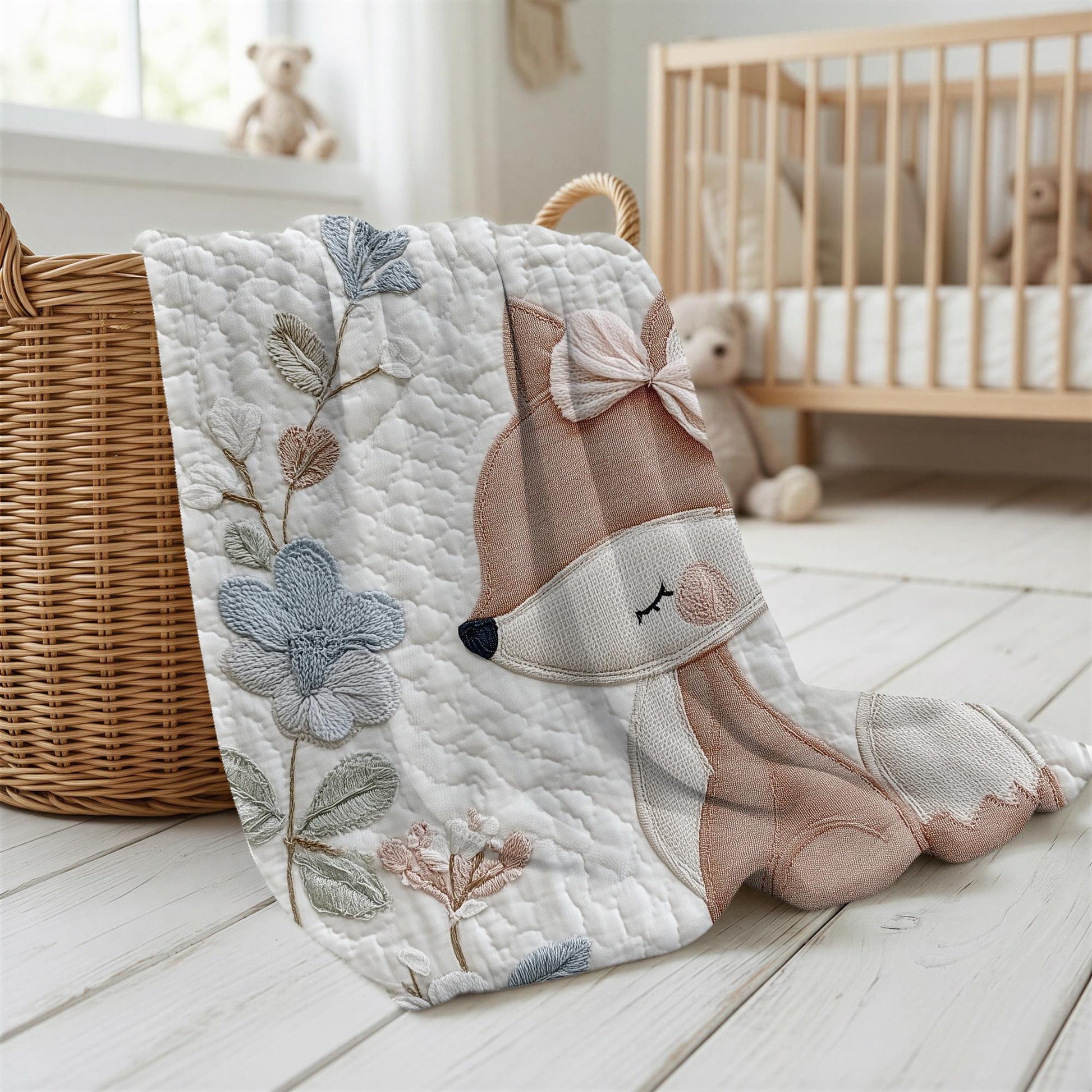 Fox baby blanket with an elegant embroidered-look fox and soft florals in muted blue, peach and ivory tones. A cozy neutral nursery blanket and timeless baby gift.