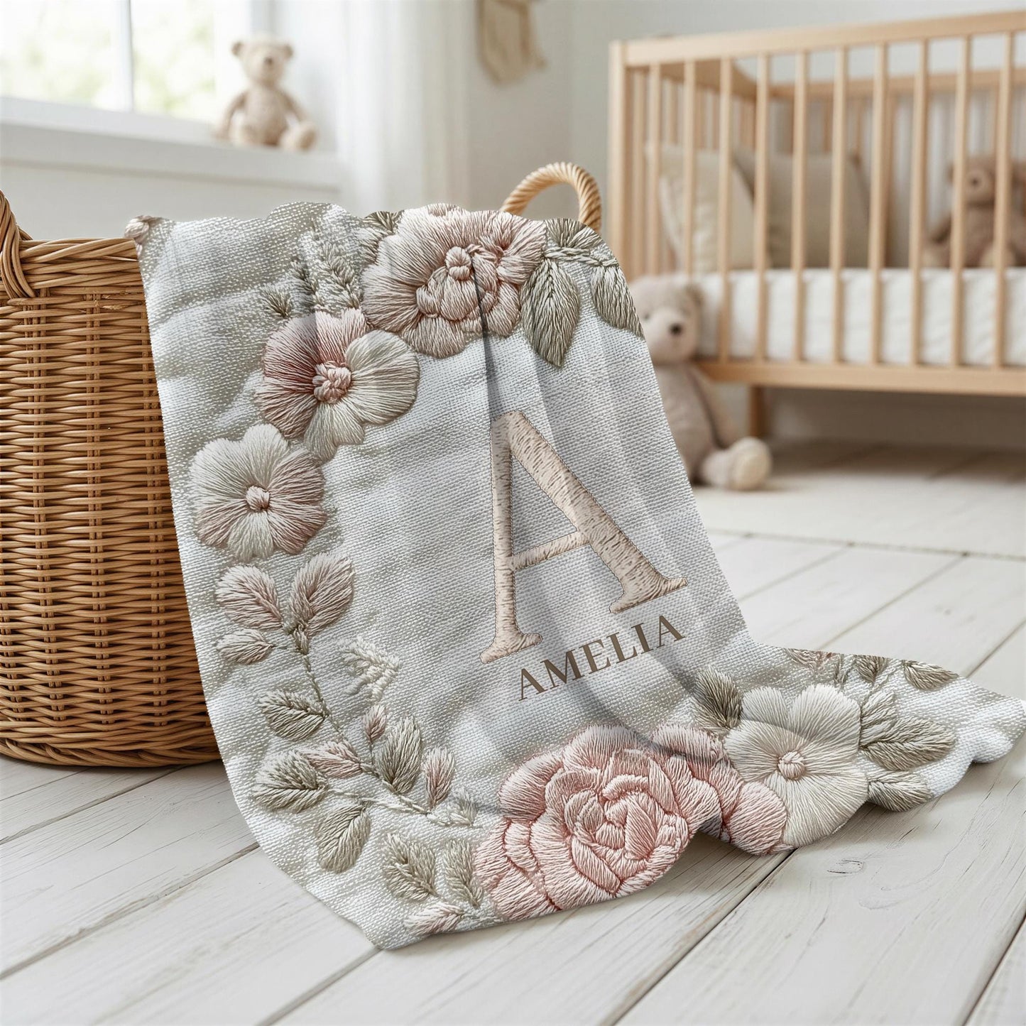 Personalized floral monogram baby blanket with elegant embroidered-look design. Soft, cozy fabric in calm neutral tones — a timeless nursery gift.
