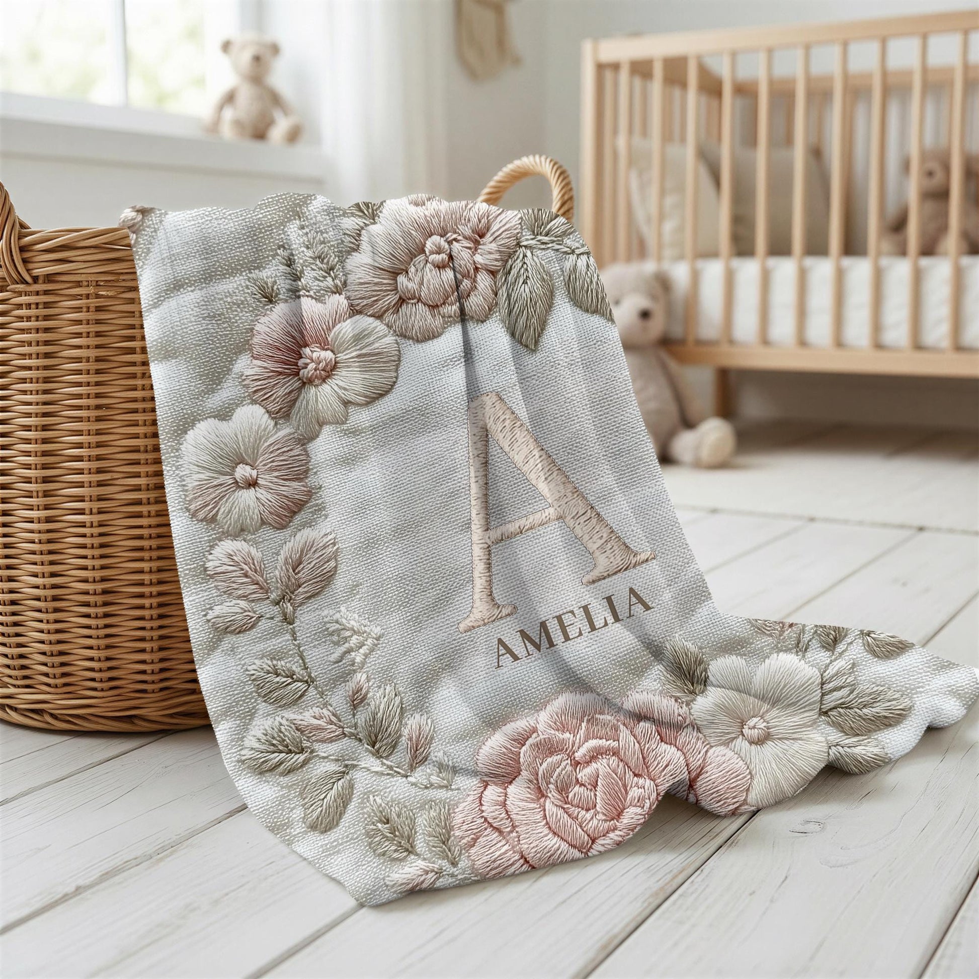 Personalized floral monogram baby blanket with elegant embroidered-look design. Soft, cozy fabric in calm neutral tones — a timeless nursery gift.
