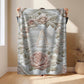 Personalized floral monogram baby blanket with elegant embroidered-look design. Soft, cozy fabric in calm neutral tones — a timeless nursery gift.