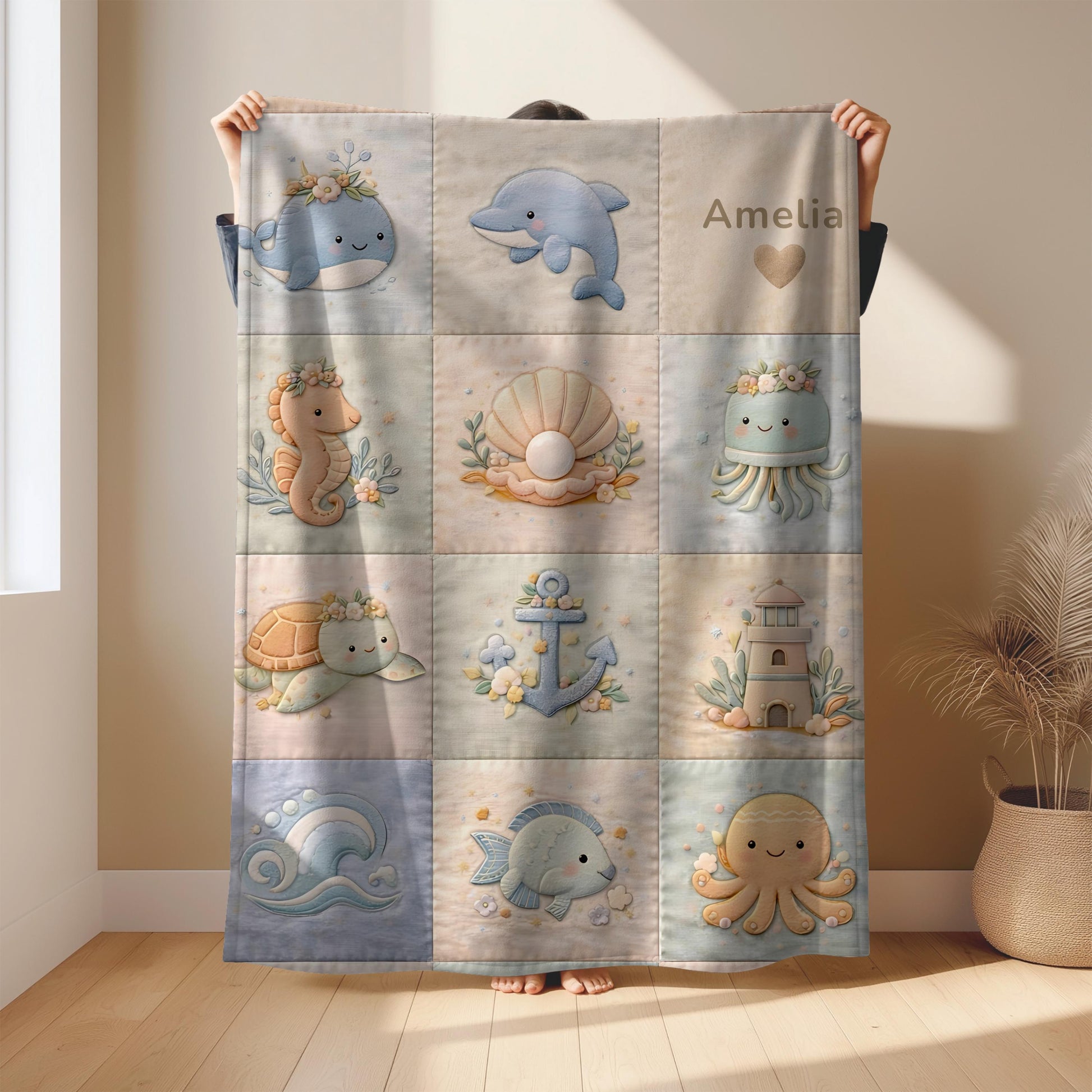 Personalized patchwork look baby blanket with name, whale, octopus and crab in a soft underwater quilt design. Cozy newborn blanket and baby gift.