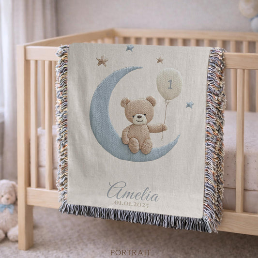 A timeless first birthday keepsake blanket, woven from cotton and personalized with your child’s name and a custom number — made to be gifted and treasured for a lifetime.