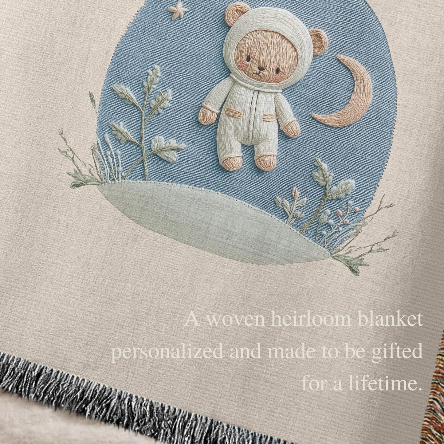 Personalized astronaut teddy woven blanket made from 100% cotton. A calm space-themed nursery design with a teddy bear in an astronaut suit, woven in an embroidered-look finish — custom name and optional birth date included.