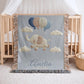 Personalized elephant woven blanket made from 100% cotton. A soft sky-themed nursery design featuring a baby elephant floating with balloons, woven in an embroidered-look finish — custom name and optional birth date included.