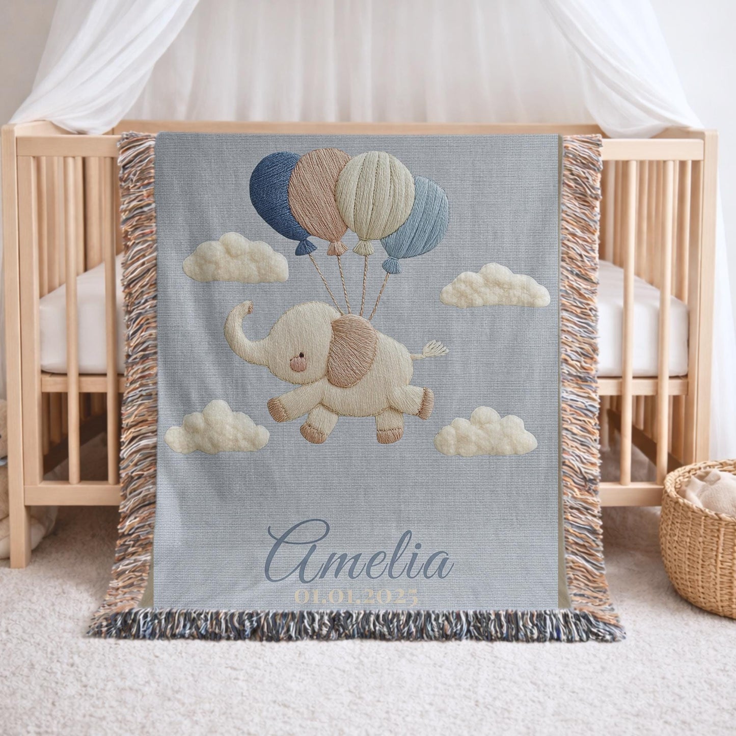 Personalized elephant woven blanket made from 100% cotton. A soft sky-themed nursery design featuring a baby elephant floating with balloons, woven in an embroidered-look finish — custom name and optional birth date included.