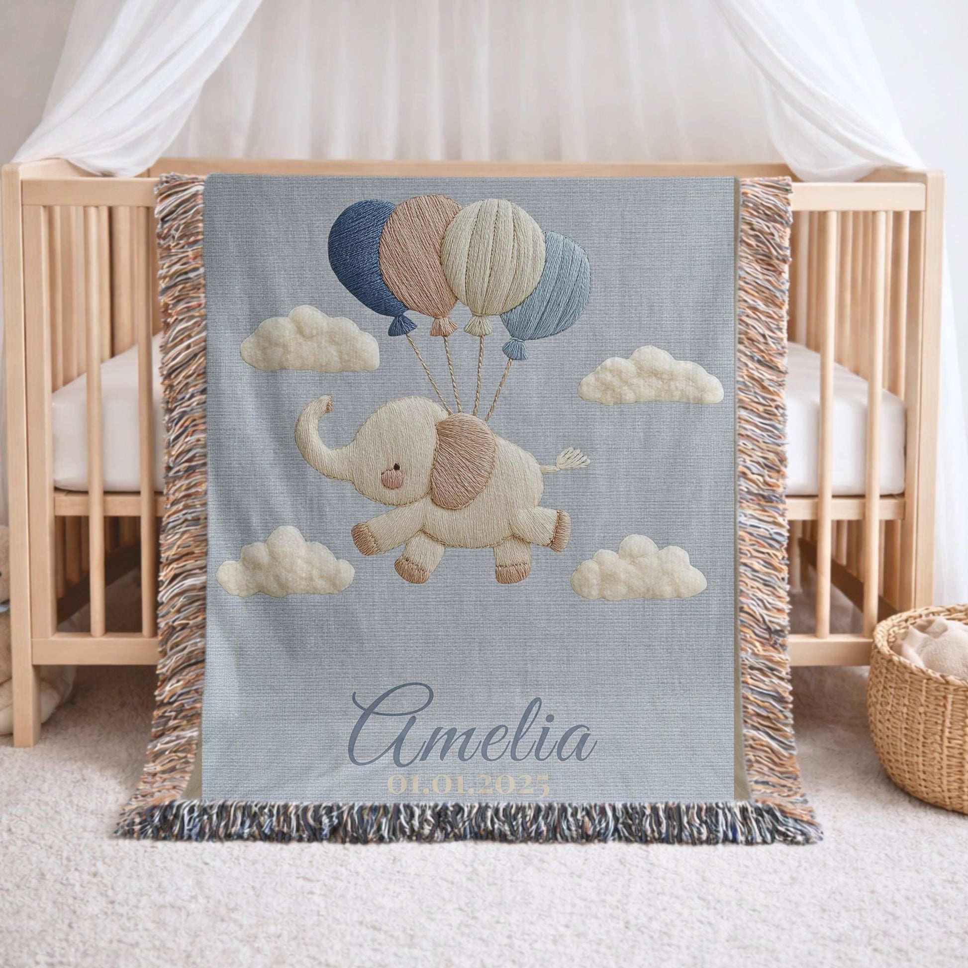 Personalized elephant woven blanket made from 100% cotton. A soft sky-themed nursery design featuring a baby elephant floating with balloons, woven in an embroidered-look finish — custom name and optional birth date included.