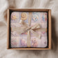A personalized pink ocean baby quilt blanket with your baby’s name, designed in a soft patchwork look with gentle mermaid-inspired sea motifs.